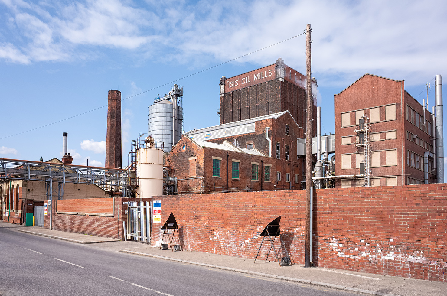 Industrial area in Hull with chimney and old storage - Oil industry Hull